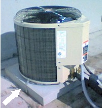 Payne Air Conditioner installed and secured to a pad